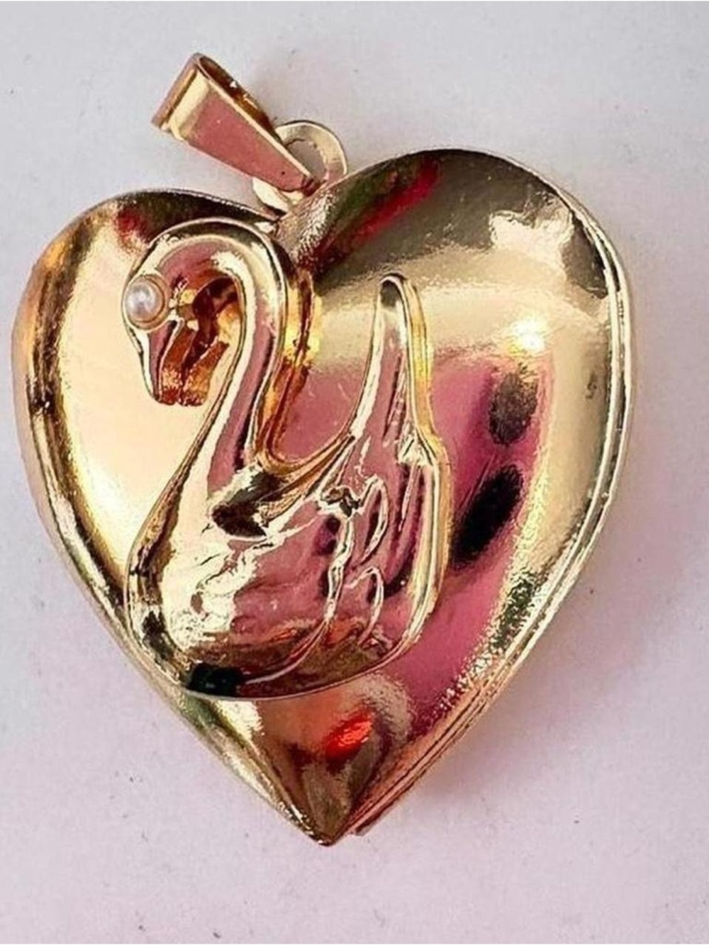 Gold tone Heart Swan locket Pendant